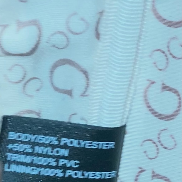 Guess Green Small Nylon Backpack:small discoloration inside by tag. Looks new. - Picture 10 of 13